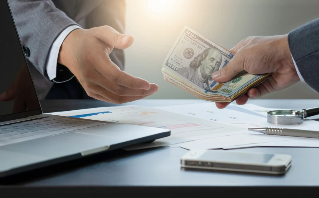 Offering payment in a business transaction.