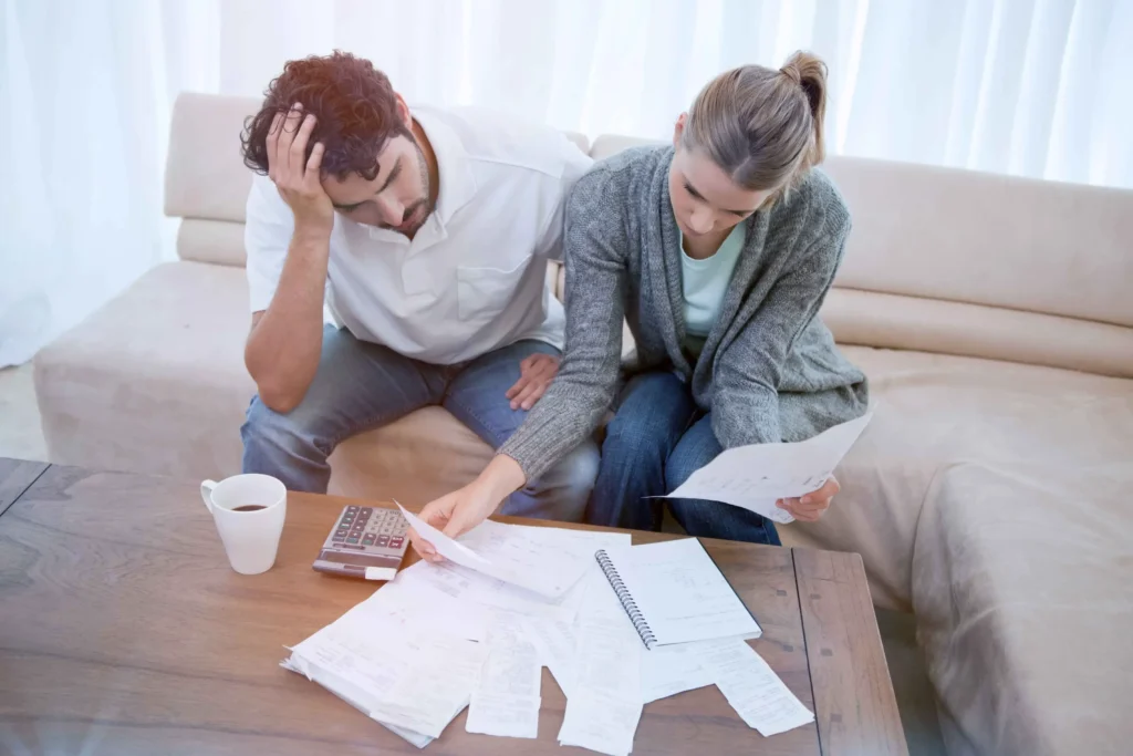 A couple reviewing insurance documentation.